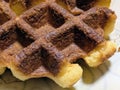 A close-up image of a piece of baked brown waffle Royalty Free Stock Photo