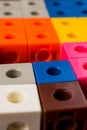 Close-up image of a pile of multicolored cubes for children to assemble