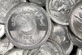 A pile of Pakistani one rupee coins in macro Royalty Free Stock Photo