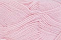 A close up image pink of wool yarn for knitting. Background Royalty Free Stock Photo