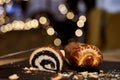 Close up image of poppy seed roll cake, traditional Christmas beigli on table at home, restaurant or patisserie