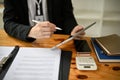 Close-up image of a professional businessman using his tablet at his desk Royalty Free Stock Photo