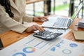 Close-up image of a professional businesswoman analyzing business financial data on reports Royalty Free Stock Photo