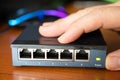 Close-up image of a router being put into service Royalty Free Stock Photo