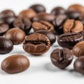 A close-up image of scattered coffee beans on a white surface Royalty Free Stock Photo