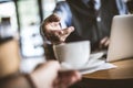 Close up image of senior businessman taking coffee. Focus on han Royalty Free Stock Photo