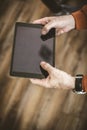 Close up image of senior businessman using digital tablet. Focus Royalty Free Stock Photo