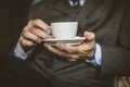 Close up image senior businessmen with a cup of coffee.