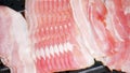 Close up image of several bacon stripes in a pan Royalty Free Stock Photo