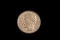 An old Italian lira coin shot against a black background Royalty Free Stock Photo