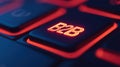 Close-Up of Illuminated B2B Key on Modern Keyboard with Neon Glow Effect Royalty Free Stock Photo