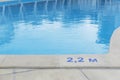 close up image of signs of depth in meters in swimming pool Royalty Free Stock Photo