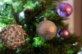 Close-up image with Silver and purpple Christmas balls on tree