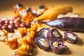 Close up image of Sliced peaces of Churchkhela on the wooden surface and blank space background. Georgian delicasy and traditional