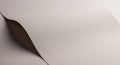 A close-up image of a smooth, slightly textured sheet of plain white paper with a gentle curve Royalty Free Stock Photo