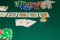 A close up image of stacked poker chips and a royal flush. A textured background.Copy paste place Royalty Free Stock Photo