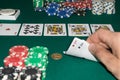 A close up image of stacked poker chips and a royal flush. A textured background.Copy paste place Royalty Free Stock Photo