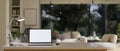 Close-up image of study table in modern contemporary living room with laptop mockup Royalty Free Stock Photo