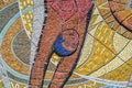 Close-up image of a swimmer athlete on an old Soviet mosaic.