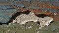 A close up image of a textured peeling wall with layers of paint Royalty Free Stock Photo