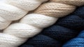 A close-up image of three different colored yarns, arranged in a diagonal line. Royalty Free Stock Photo