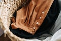 Close up image of a wicker basket full with summer dresses for washing laungry. Royalty Free Stock Photo