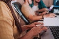 Close up image of woman hands typing on laptop computer keyboard and surfing the internet on office table, online Royalty Free Stock Photo