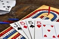 Wooden Cribbage Board and Playing Cards