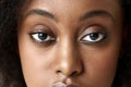 Close-up image of young african woman, eyes, nose. Model looking at camera. Beauty standards and acceptance Royalty Free Stock Photo