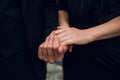 Close-up image of a young couple holding hands. Royalty Free Stock Photo