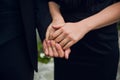 Close-up image of a young couple holding hands. Royalty Free Stock Photo