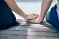 Close-up image of a young couple holding hands. Concept of love, family and close Royalty Free Stock Photo