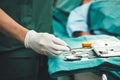 Close up images of the hand of a doctor holding equipment for bullet clamps Royalty Free Stock Photo