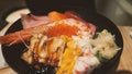Close up images of japanese seafood rice bowl or kaisendon sashimi donburi