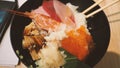 Close up images of japanese seafood rice bowl or kaisendon sashimi donburi