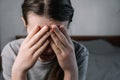 Close up images of thoughtful insecure young woman touching forehead having headache migraine or depression, stressed frustrated Royalty Free Stock Photo