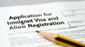 Close-Up of Immigration Visa Application With Pencil Royalty Free Stock Photo