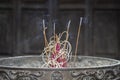 Close-up of incense sticks burning with smoke in buddhist temple , Vietnam Royalty Free Stock Photo