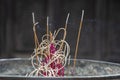 Close-up of incense sticks burning with smoke in buddhist temple , Vietnam Royalty Free Stock Photo