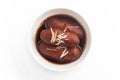 Close-up of Indian Bangali traditional sweet dish Pitha or Peetha Roshopuli made from red sweet potato, garnished with chopped Royalty Free Stock Photo