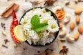 Close-up of Indian Basmati steamed Rice or matar Pea pulao or Pulav garnished with fresh green mint leaf in a black bowl Royalty Free Stock Photo