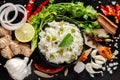 Close-up of Indian Basmati steamed Rice or matar Pea pulao or Pulav garnished with fresh green mint leaf in a black bowl Royalty Free Stock Photo