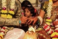 Close up of Indian couples hands at engagement ceremony Royalty Free Stock Photo