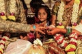 Close up of Indian couples hands at engagement ceremony