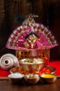 Close-up of indian home temple during the birthday celebration of Lord Krishna Janmashtami with puja thali and kheer khir