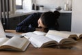 Close up Indian woman falling asleep at work desk Royalty Free Stock Photo