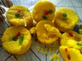 Close up of Indian yellow sweets also known as peda, petha and barfi in box Royalty Free Stock Photo