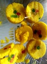Close up of Indian yellow sweets also known as peda, petha and barfi in box Royalty Free Stock Photo