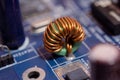 Close up Inductor electronic hardware technology on motherboard digital chip