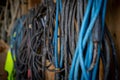 Close up of industrial cables hanging in workshop Royalty Free Stock Photo